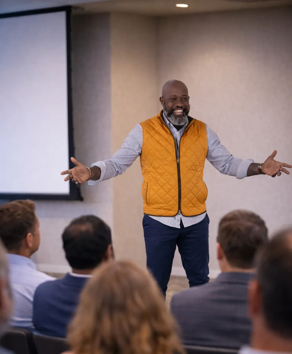 Hugo Maynard speaking to a corporate audience